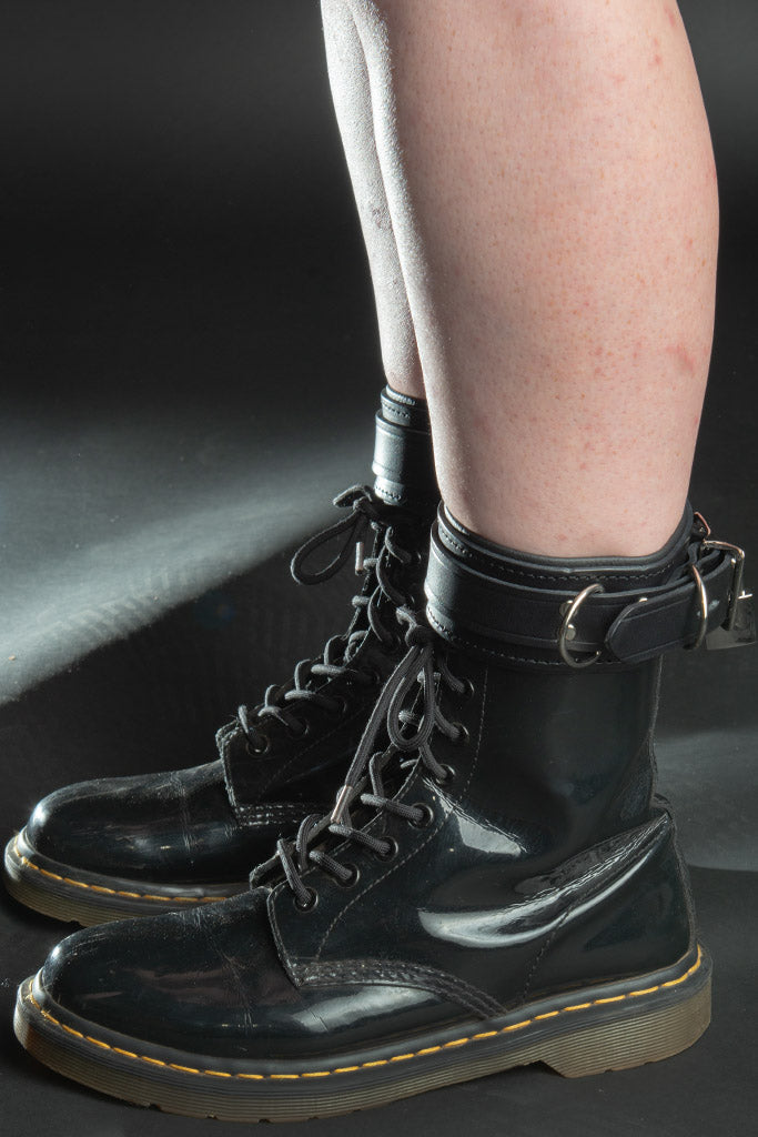 Leather submissive ankle cuffs