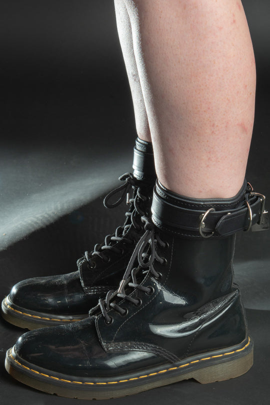 Leather submissive ankle cuffs